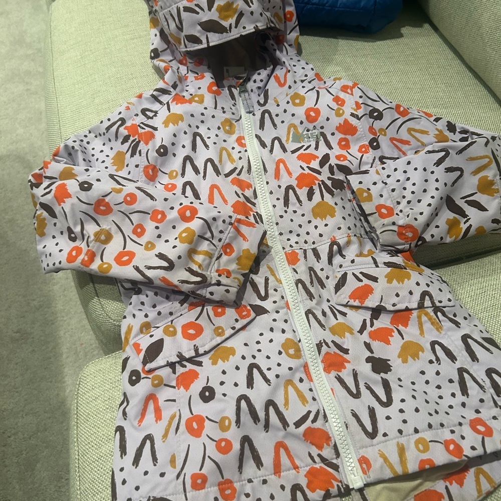 REI hooded rain jacket floral size 4/5